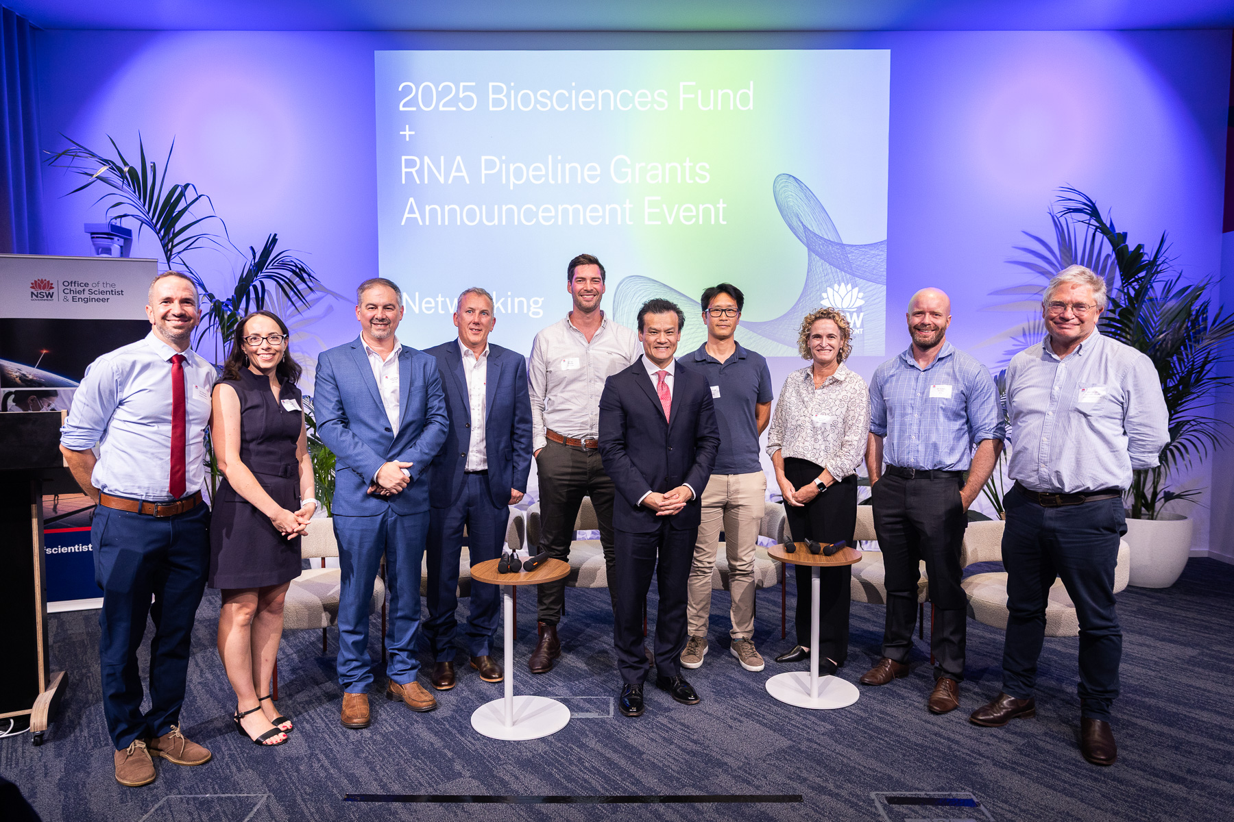Minister Chanthivong (centre) and Professor Hugh Durrant-Whyte (right) with grant recipients from the Biosciences Fund and RNA Pipeline Grants, Greenhouse, 5 March 2026.
